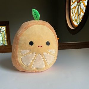 Adorable orange Squishmallow -- Orin the Orange